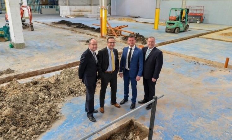 Work in progress: HSBC’s Dan Wilson (centre left) with Northcoast Seafood’s Steve Berry (left), Fridrik Thorsteinsson (centre right) and Mike Atkinson (right)