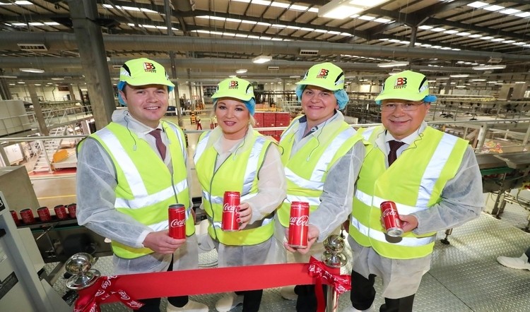 First Minister Rt Hon Arlene Foster and her deputy Michelle O’Neill celebrate the new canning line 
