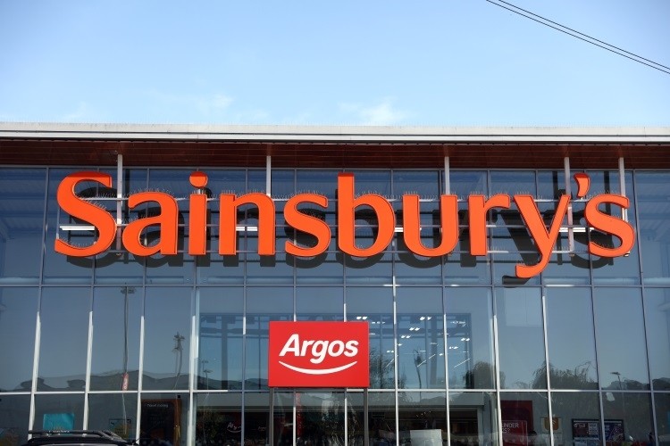 Sainsbury's is pledging to pay small suppliers within 14 days if its merger with Asda is approved by the CMA