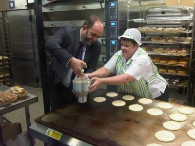 Food minister David Heath tried his hand at the sharp end of food production during his visit to Asda