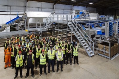 Some of Branston’s workforce pictured in front of the new production line