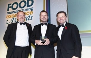 Winning smiles: Jimmy Doherty (centre) collects his Food Manufacturing Personality of the Year award from editor Rick Pendrous and Chris Hollins, awards host and BBC sports commentator.