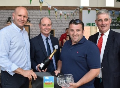 Phil Spenceley of Tesco (left), HCC's Kevin Roberts (centre-left) and 2 Sisters' John Dracup (right) present Mr Jones (centre-right)as winner of the annual steak competition