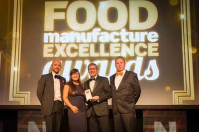 Double Oscar honours: Jeremy Faulkner, md SK Chilled Foods (centre right) and NPD manager Emma Bell, receive the first of two trophies from category sponsor Kevin Haynes (right) and awards host Matt Dawson
