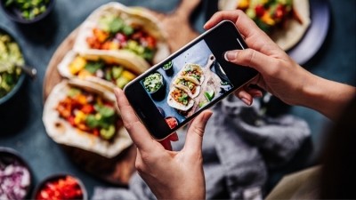 Social media apps like TikTok are influencing the food and drink manufacturing sector more than ever before. Credit: Getty / alvarez