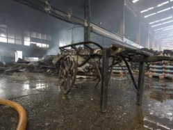 The blaze damaged wooden pallets and stock including fruit and vegetables